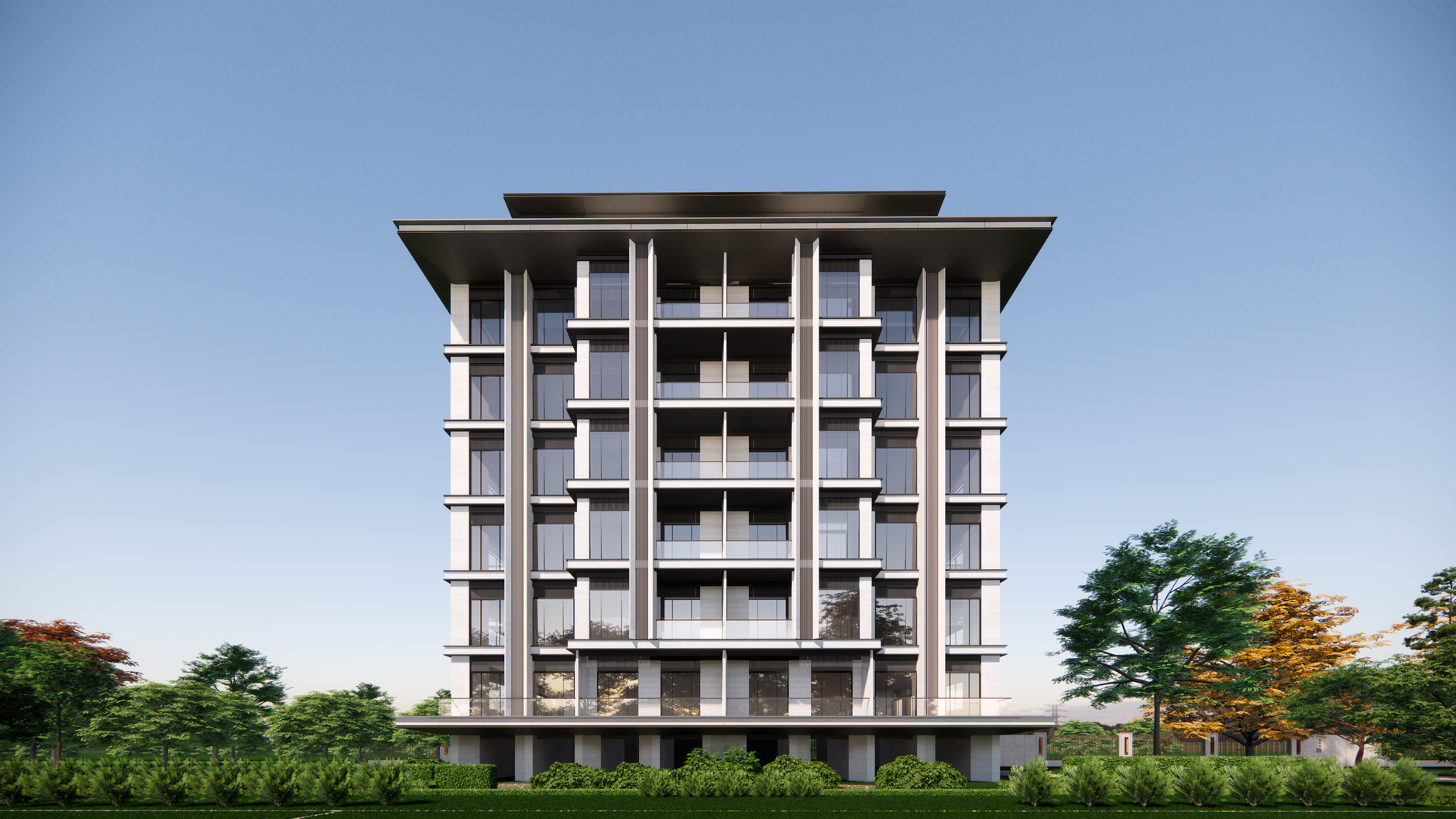 Edifício de apartamentos contemporâneo em destaque contra um céu azul claro.